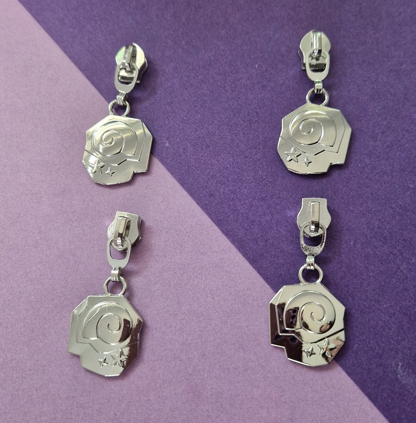Fossil shaped silver or rainbow #5 zipper pull